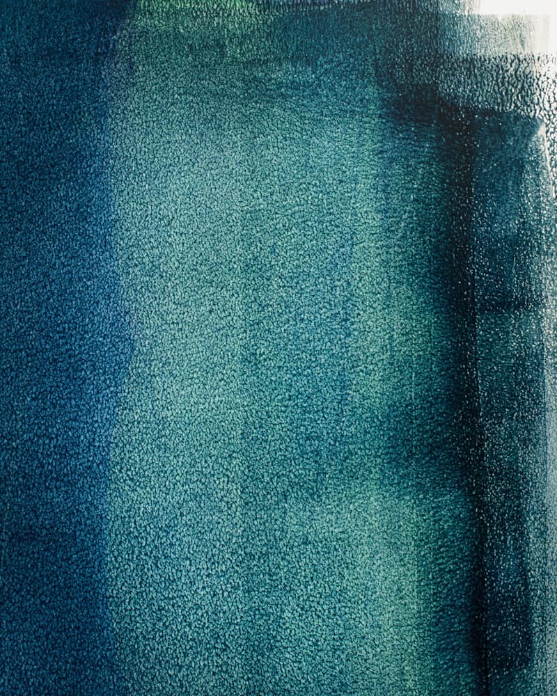 Blue-black fountain pen ink written out on a swatch card.