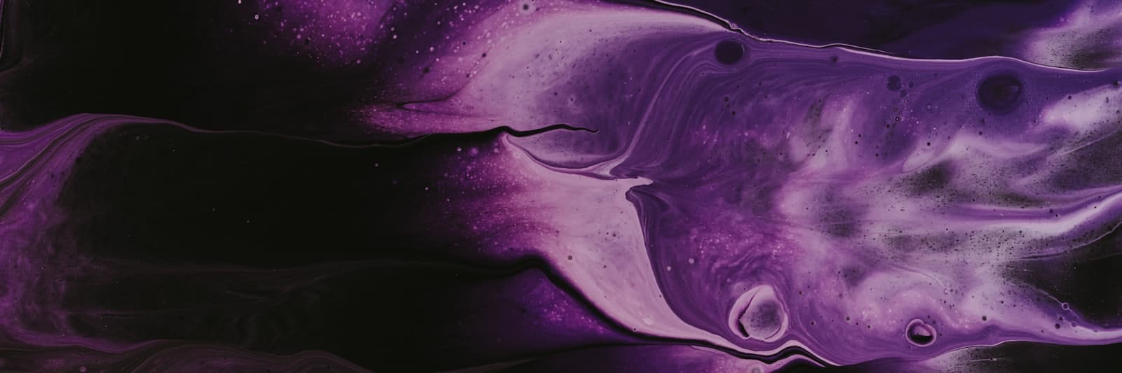 Bruise Violet fountain pen ink, written out with a broad nib.